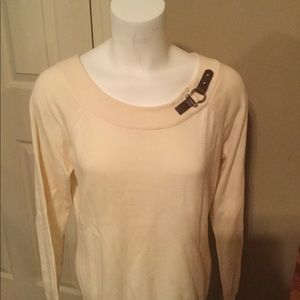 Sweater with leather embellishments